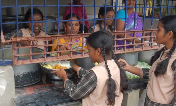 Girls lined up for a meal at our current kitchen