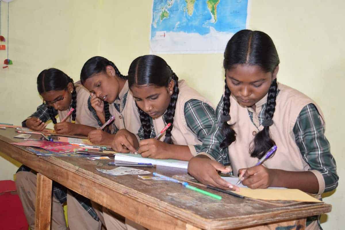 group of girls working on homework