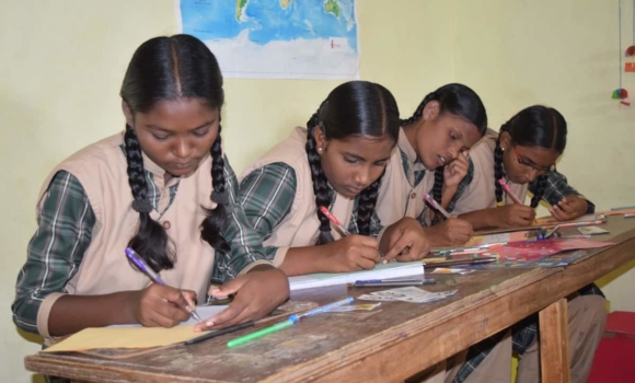 group of girls working on homework