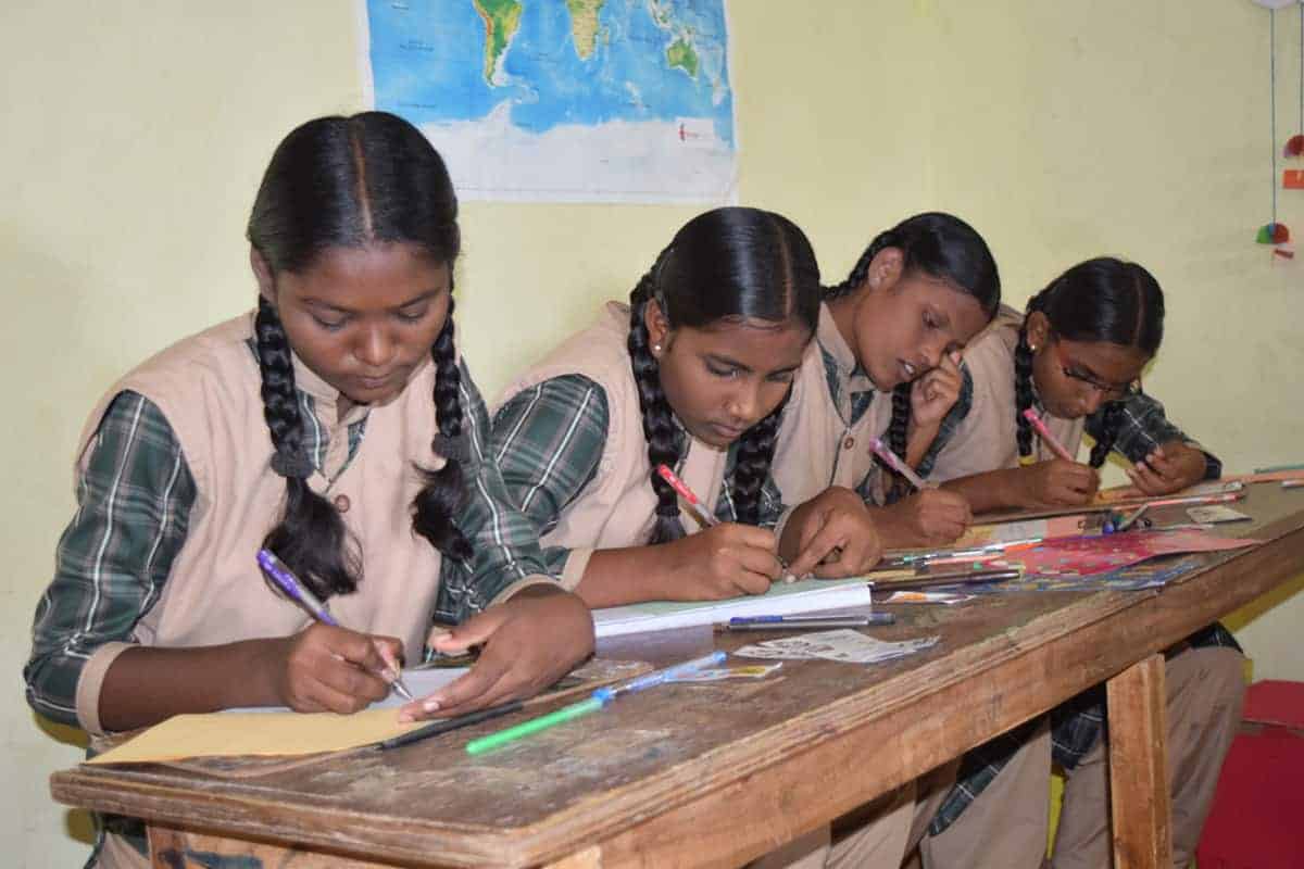 group of girls working on homework