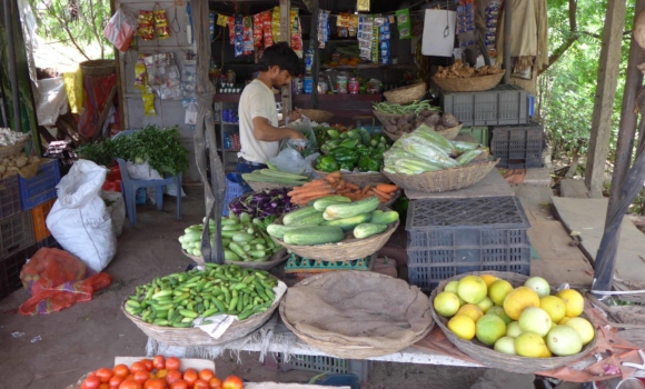 man shopping for food at local market