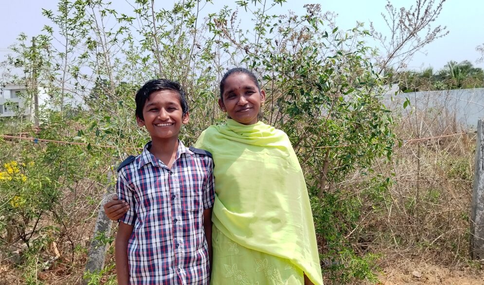 a Young man and his mother at the children's Home in India