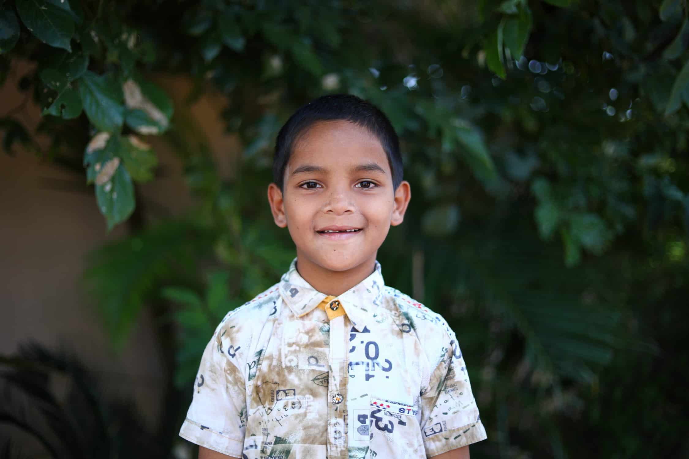 Young boy at Children of Faith in India.