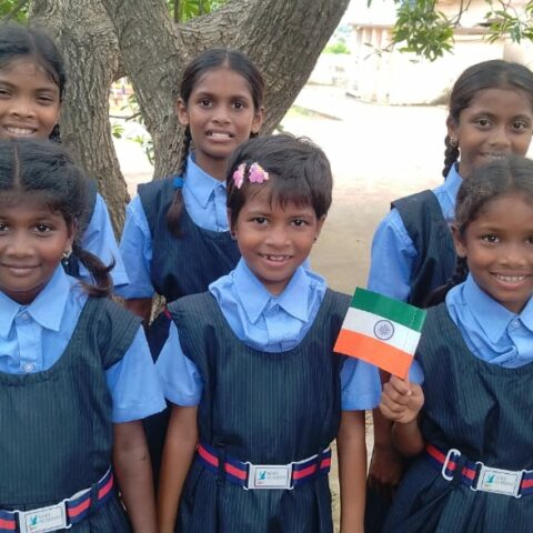 Children celebrate India's Independence Day with flags and patriotic songs at Children of Faith