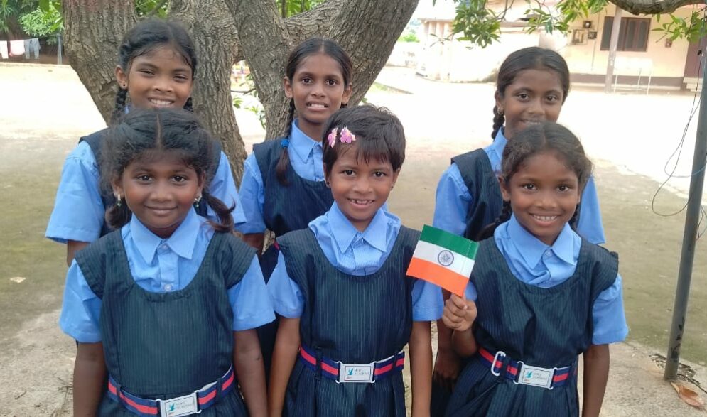 Children celebrate India's Independence Day with flags and patriotic songs at Children of Faith