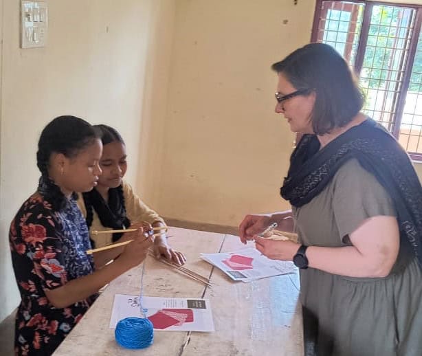 Visitor teaches knitting at Children of Faith in India