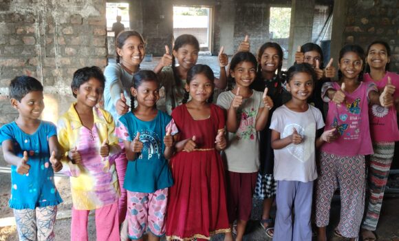 Children visit construction of new kitchen dining Hall