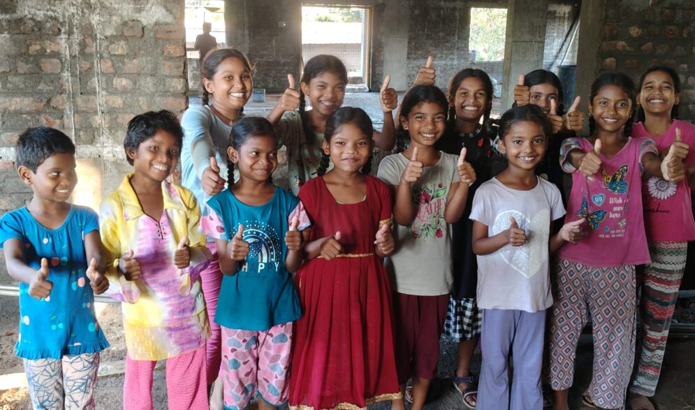 Children visit construction of new kitchen dining Hall